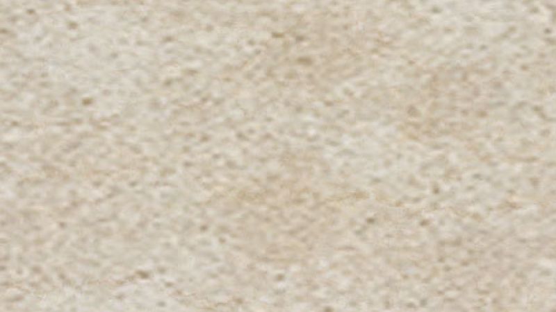 Closeup sample of cut quartzite stone slab.